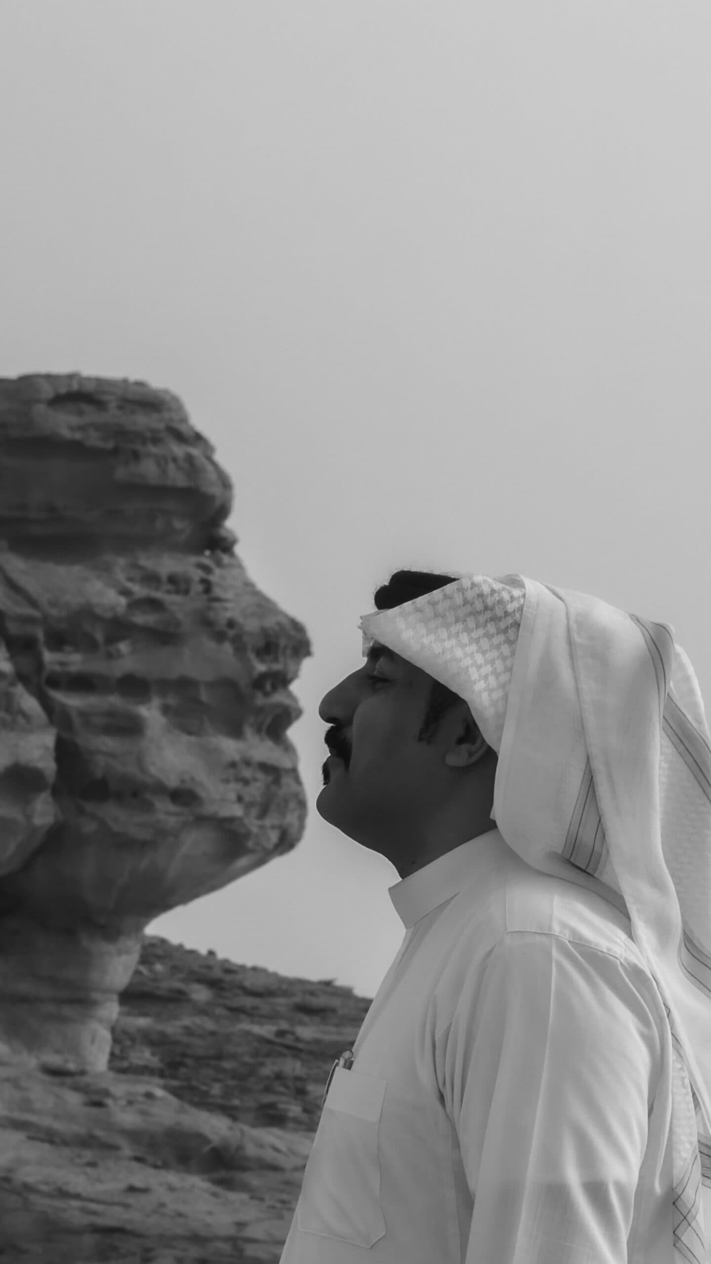 Writers touring Hegra, AlUla's ancient rock-cut city